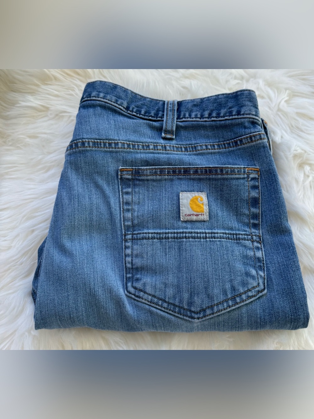 Carhartt Blue Denim Jeans with Yellow Logo Patch